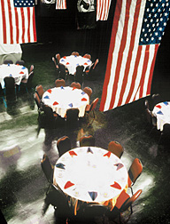 dining hall with u.s. flags hanging from ceiling